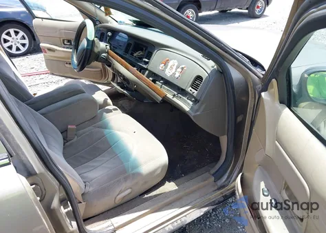 2001 Ford Crown Victoria from USA, damaged, VIN 2FAFP73W71X194548